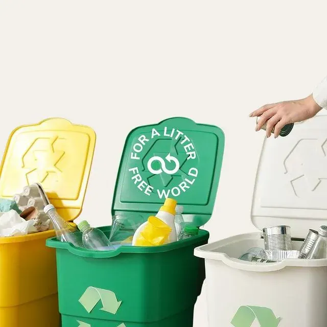 Open recycling bins with bottles and cans, suitable for a campus recycling challenge