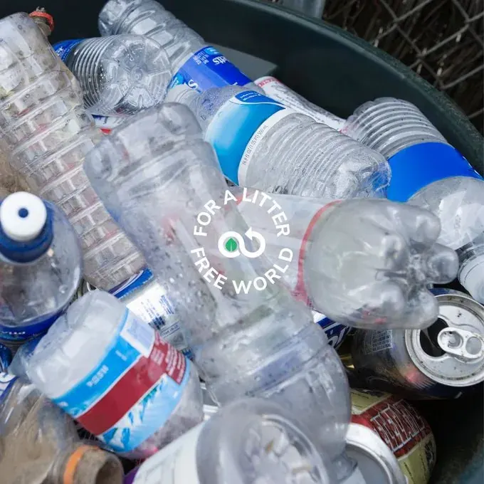 Bin filled with crushed plastic bottles and cans for recycling in Dubai Bin filled with crushed plastic bottles and cans for recycling in Dubai
